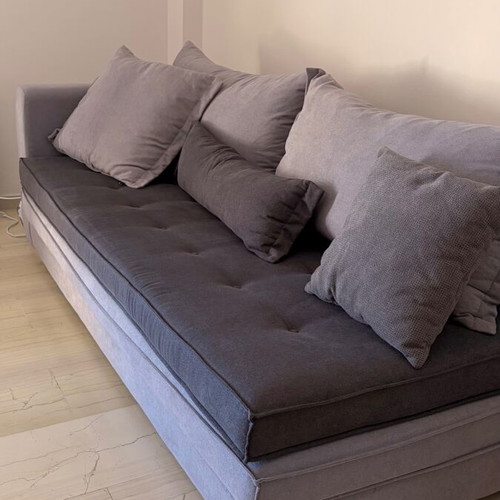 Two-seater sofa like new with reversible gray seat