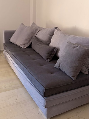 Two-seater sofa like new with reversible gray seat