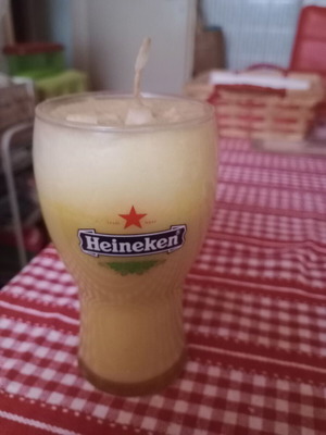 Heineken beer glass with candle like new