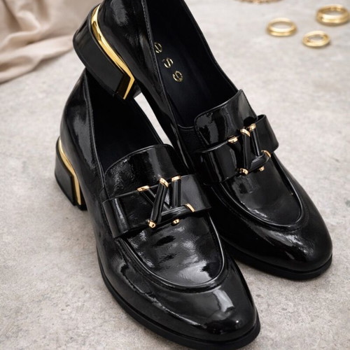 Women's black patent loafers with gold detail like new