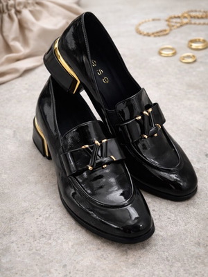 Women's black patent loafers with gold detail like new