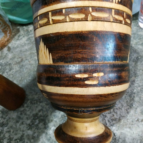 Wooden garlic grater used