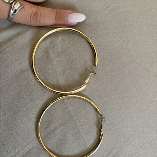 Gold color faux earrings used, slightly faded