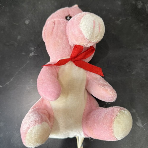 Plush pig with red bow
