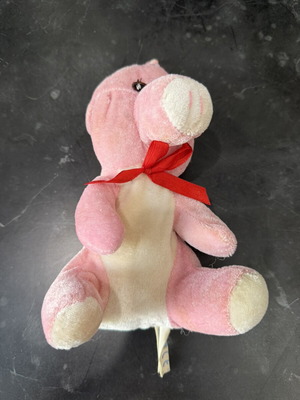 Plush pig with red bow