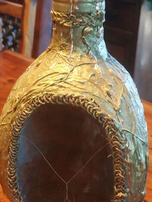 Decorative bottle with light like new, gold bronze with rose design