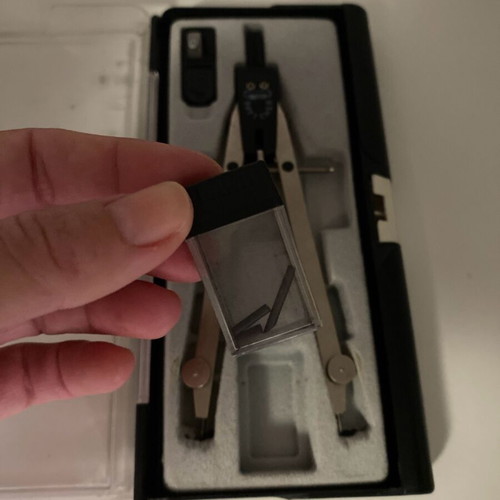 Compass used with box, sharpener, and replacement tips