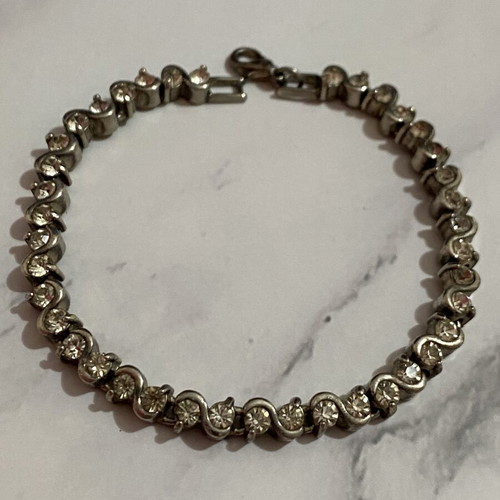 Bracelet with rhinestones used, silver color