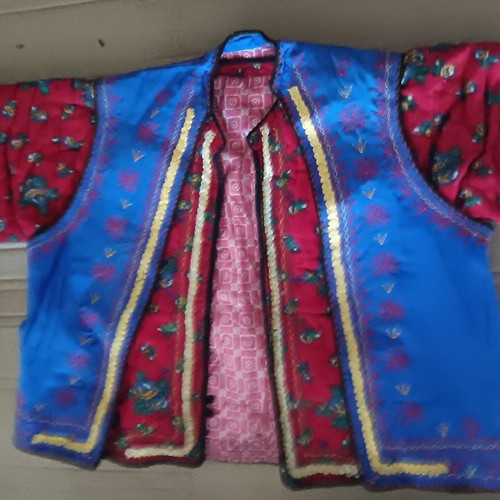 Collectible traditional costume pieces used, 2 items