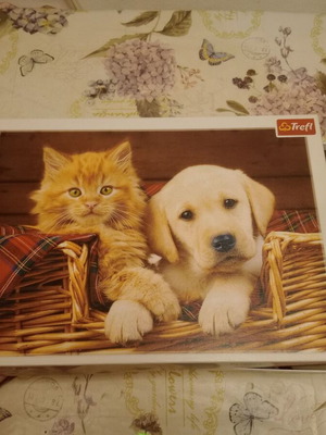 Puzzle 500 pieces like new with kitten and puppy in basket