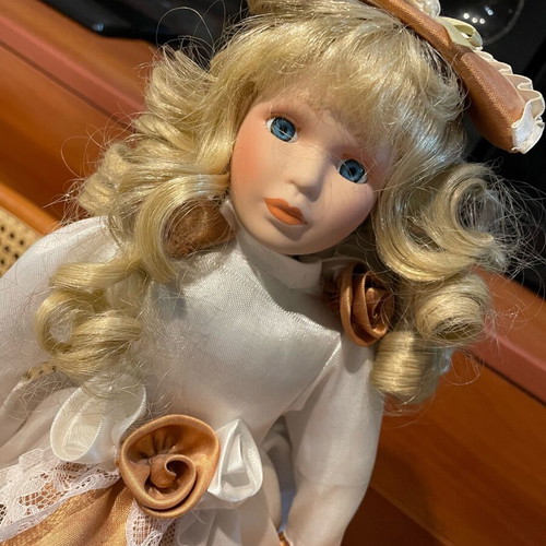 Vintage porcelain dolls like new