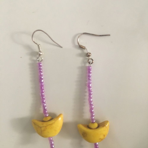 Earrings with purple beads and boat-shaped haolite