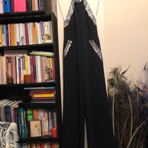 Black one-piece jumpsuit like new with sequin details