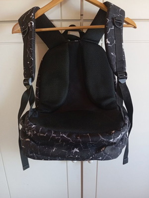Ink Dino Backpack like new with laptop compartment and three pockets