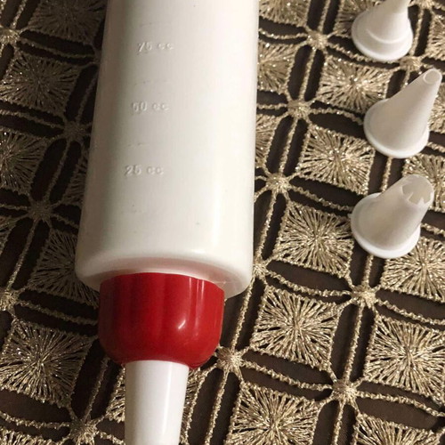 Pastry piping syringe new with 4 nozzles
