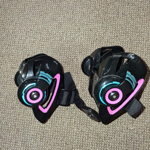Razor Jetts Heel Wheels used, adjustable size, black with blue and pink details