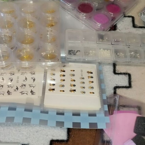 Large nail art set like new with glitter, foil, rhinestones, and decorations