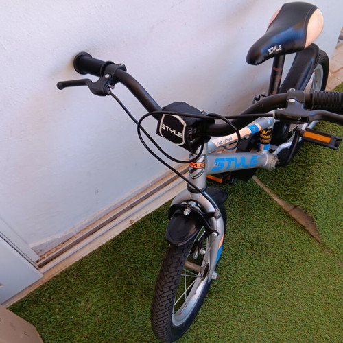 Boy's city bike silver with blue and orange designs like new with training wheels