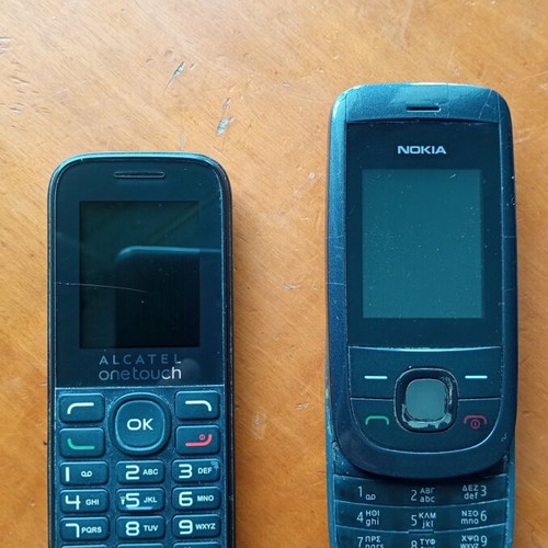 AlKATEL Onetoutch and Nokia cell phones like new, black