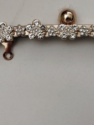 Metal frame clutch clasp with flowers and crystals, gold clip