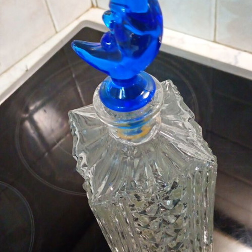Crystal carafe like new with blue crescent moon lid