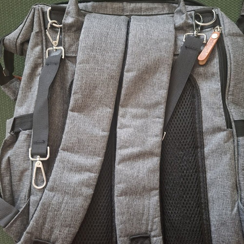 Baby backpack like new with multiple compartments and three insulated bottle holders