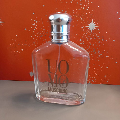 UOMO Moschino perfume bottle edp 125ml like new, empty