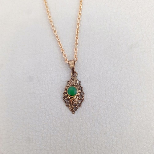 Vintage gold pendant with green stone from the 70s, like new