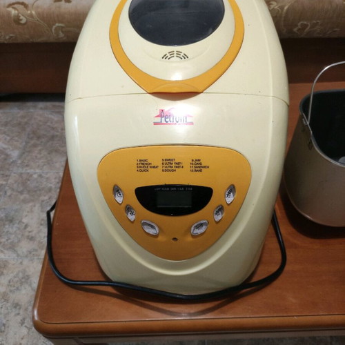 Bread maker used yellow with repaired bowl