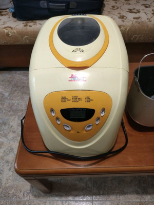 Bread maker used yellow with repaired bowl