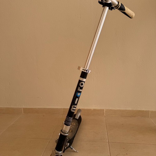Micro scooter used, heavy-duty metal with stand
