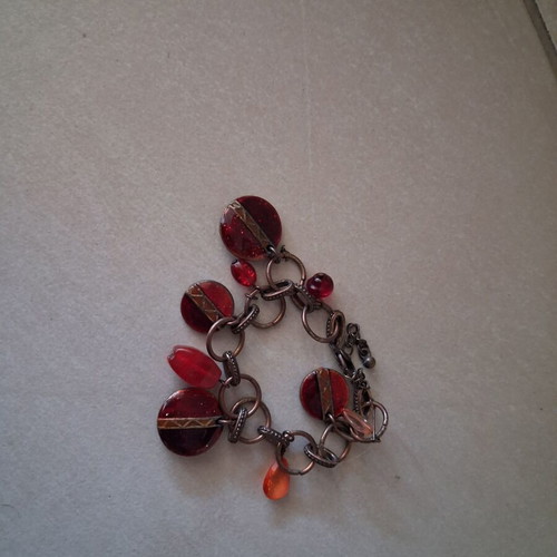 Bracelet with red stones used