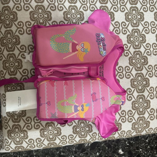 Life jacket for girls like new with sea water marks
