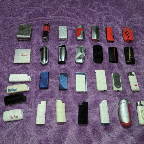 Marlboro lighters and cases used, set of 28 pieces