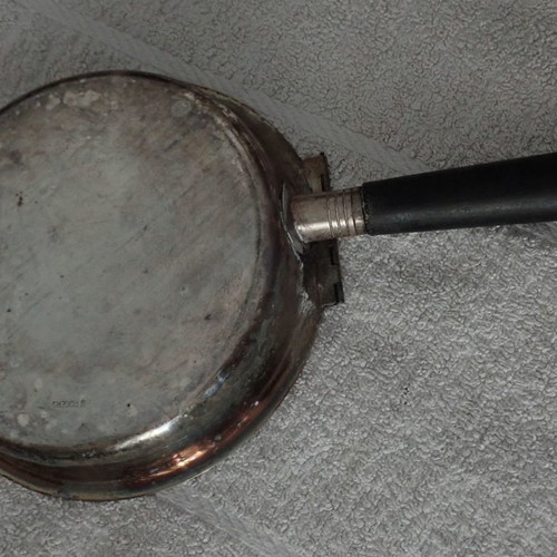 Antique heating vessel used for bed