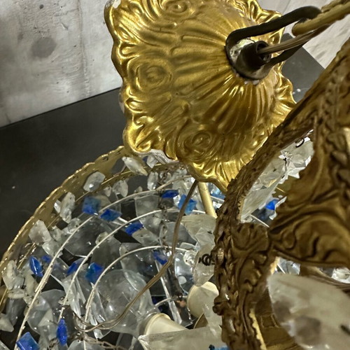 Vintage gold chandelier used with crystals and blue details