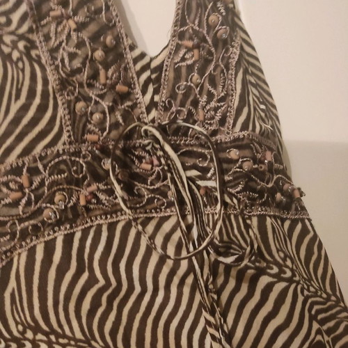 Tiger print dress used, backless, size M