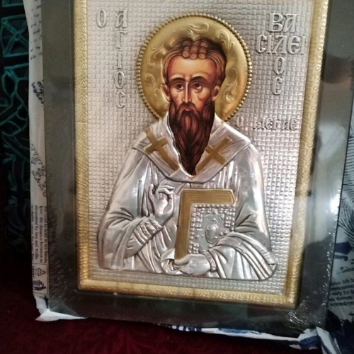 Wooden icon with metal Saint Basil new