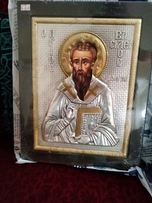 Wooden icon with metal Saint Basil new