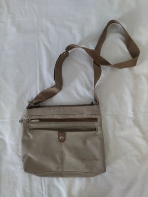 Beige crossbody bag used with brown details