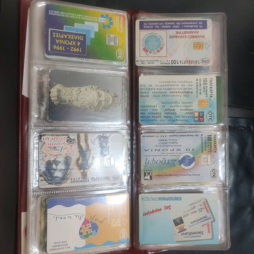 Phone cards used, album with 66 pieces