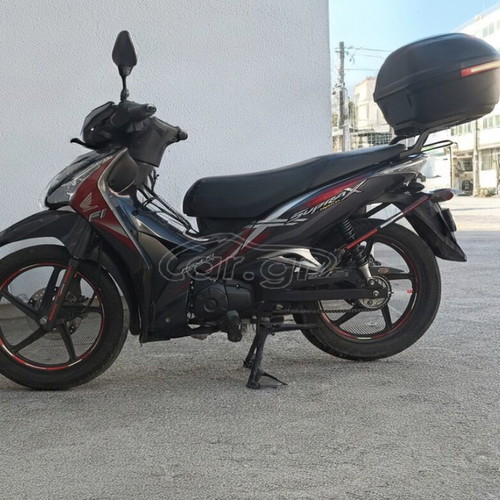 Honda Supra 125 X motorcycle with Helm-in, 2015 model