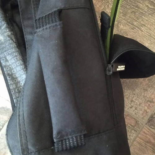 Benetton travel bag like new with multiple pockets and carrying options
