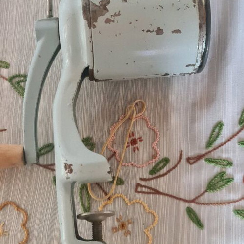 Vintage cheese grater used, table clamp