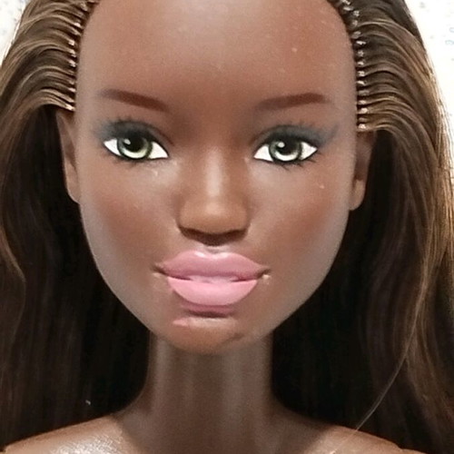Barbie Made to Move African-American doll used with small flaws