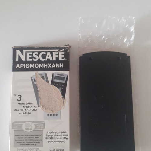 Nescafe Calculator new, may need battery to operate