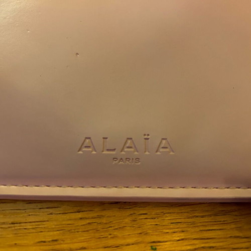 Alaïa clutch bag used, leather handheld