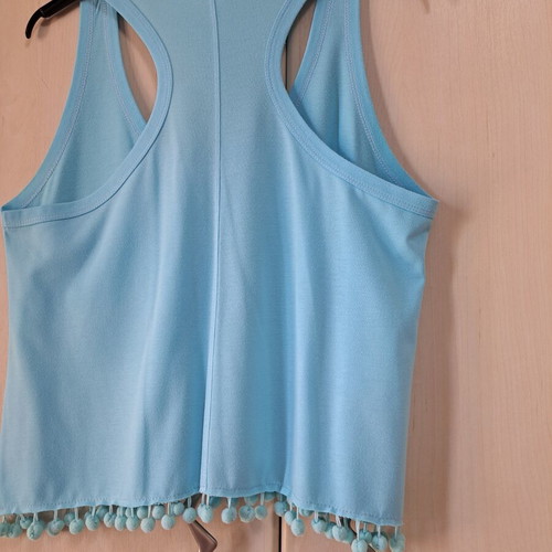 Sleeveless top new turquoise with pon pon