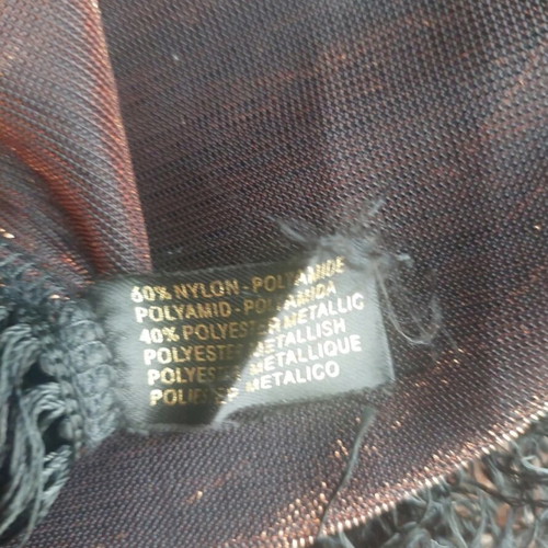 Dark brown scarf used with shimmer and fringes