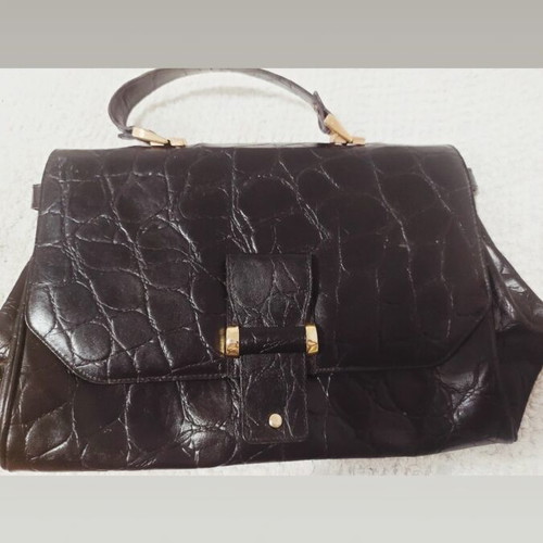Vintage black leather handbag with crocodile texture and gold details